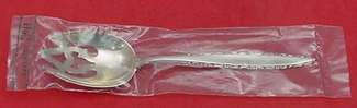 Pierced Serving Spoon factory sealed  fancy  8 3/8