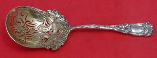Ice Spoon GW  pierced scroll design  w/ lilies  8 3/4