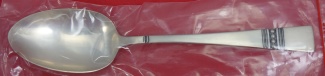 Serving Spoon factory sealed  8 5/8