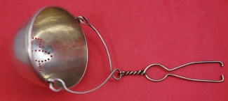 Tea Strainer pierced  w/ flower  french style  .8oz  5