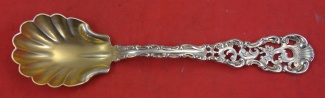 Sugar Spoon GW  shell  w/ pierced handle w/ leaves & flowers  5 1/2