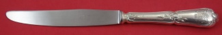 Dinner Knife by SL  w/ crest  some dents  10