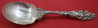 Berry Spoon w/ flowers  fluted  10 1/2