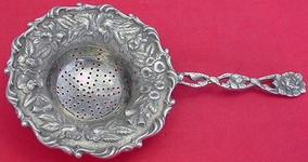 Tea Strainer cast  pierced handle  7 1/2
