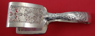 Asparagus Serving Tong from Roslyn Berlin collection pictured in the book 