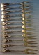Escargot Fork set of 10  GW  hand hammered and applied metals 5 7/8