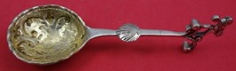 Sugar Spoon w/ figural handle  GW  cast .830 silver  4 5/8