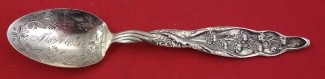 Teaspoon w/ flower & leaves in bowl mono 